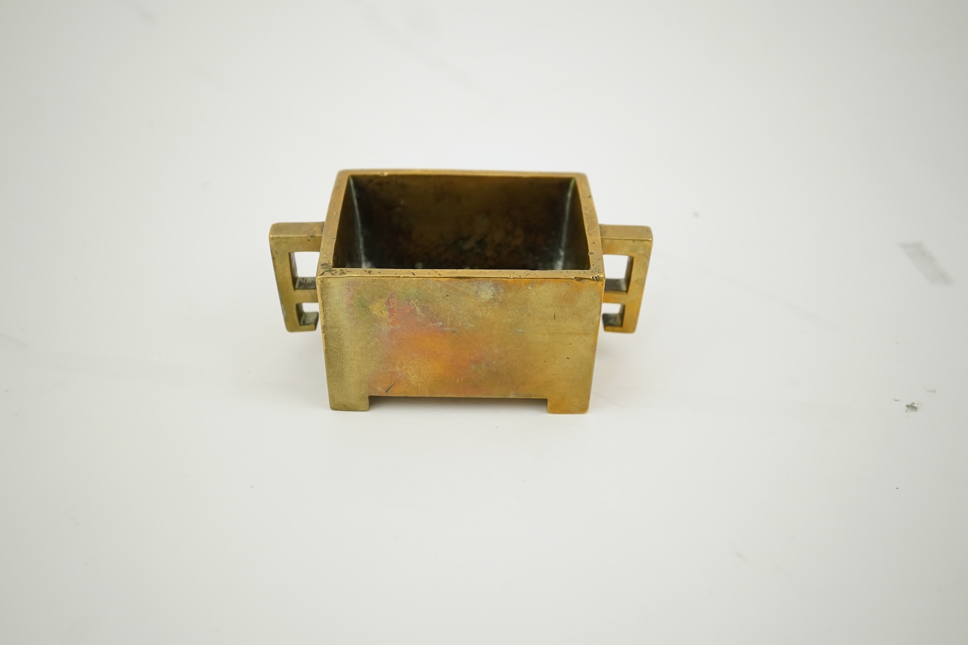 A Chinese bronze rectangular censer, fangding, Xuande mark, 18th century